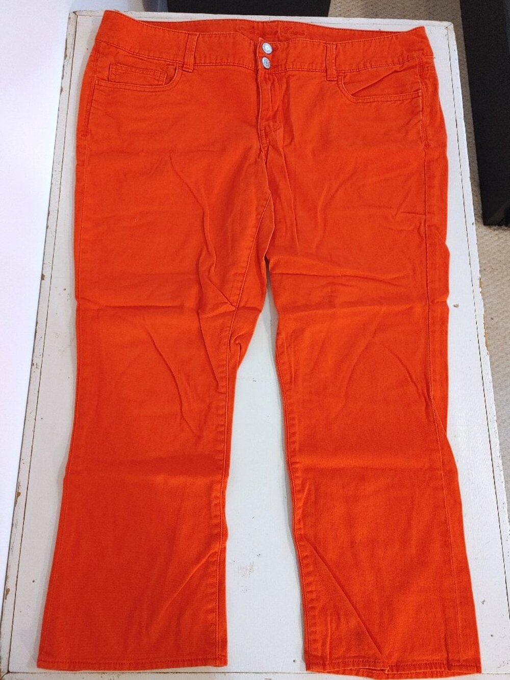 size 16 bright orange American Eagle mid-rise Artist stretch cropped jeans